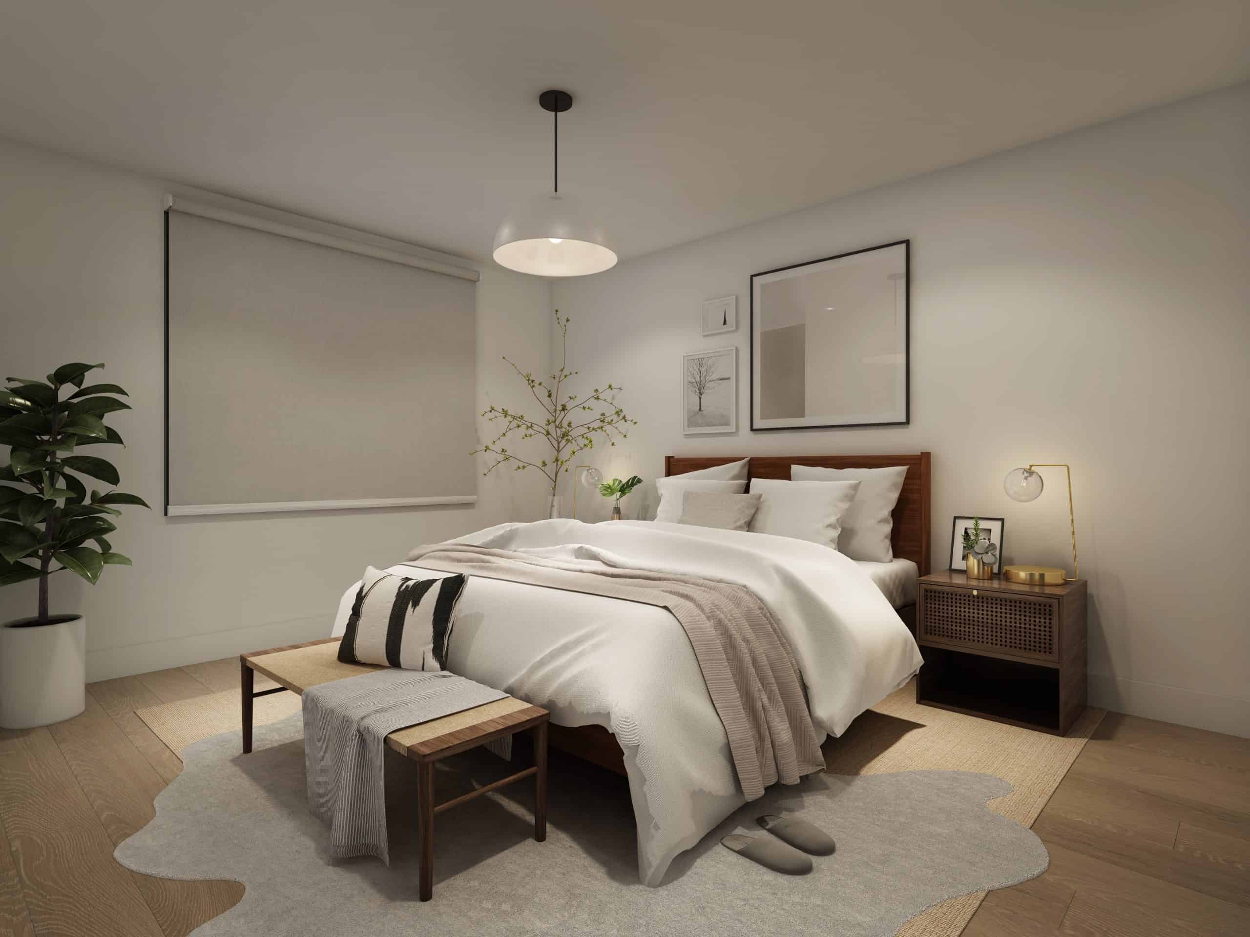 A cozy modern bedroom with a wooden bed, neutral bedding, a nightstand with a lamp and photo frame, a bench at the foot of the bed, potted plant, wall art, and a large window with a closed shade.