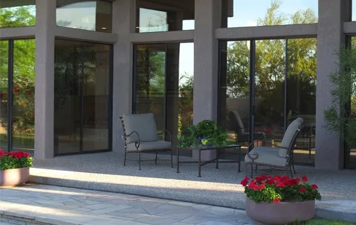 Outdoor patio with stylish seating and flower pots